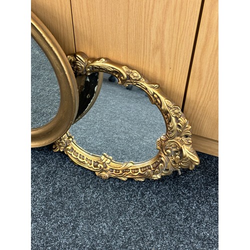 107 - Two framed mirrors includes chalk frames etc largest measures approximately 23 inches by 20 inches