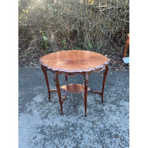 421A - Mahogany edwardian 6 legged carved table measures approximately28 inches tall 22 inches depth 32 inc... 