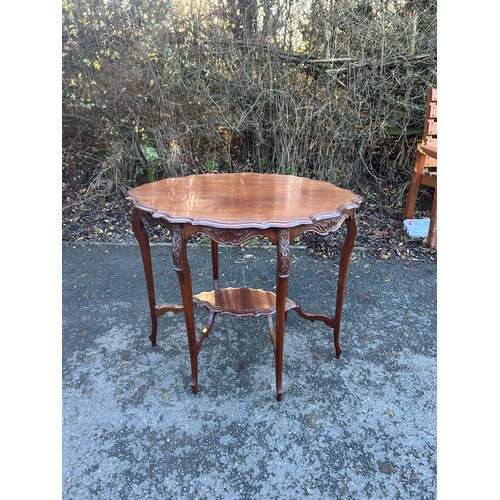 421A - Mahogany edwardian 6 legged carved table measures approximately28 inches tall 22 inches depth 32 inc... 