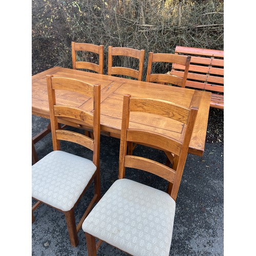 421F - Distressed Solid 2 Drawer oak  table and 6 chairs with leaf table measures 29 inches tall 91 inches ... 