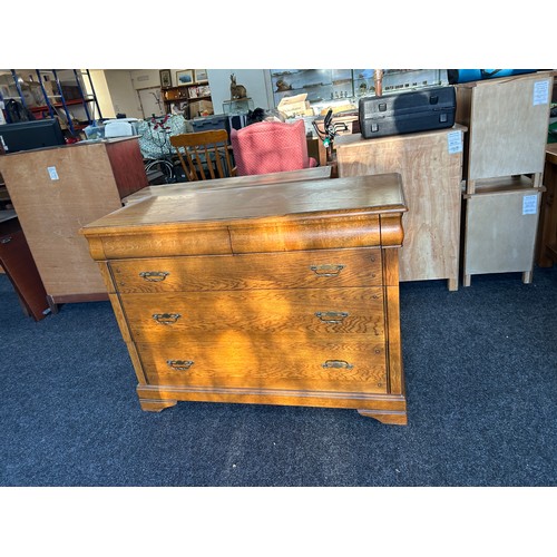 421H - Four drawer oak chest measures approximately 35 inches tall 47 inches wide 20 inches depth