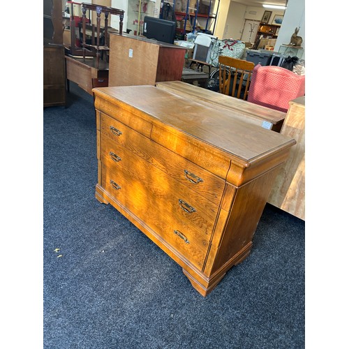 421H - Four drawer oak chest measures approximately 35 inches tall 47 inches wide 20 inches depth