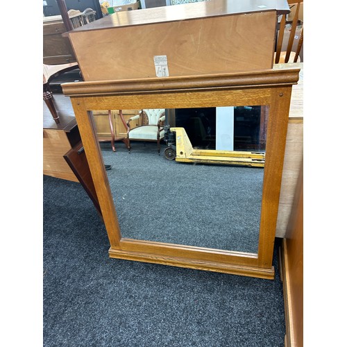 421K - Oak framed mirror measures approximately 38 inches tall 36 inches wide