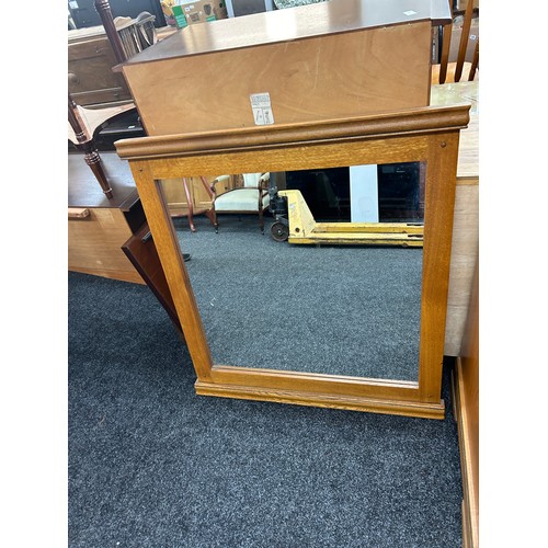 421K - Oak framed mirror measures approximately 38 inches tall 36 inches wide