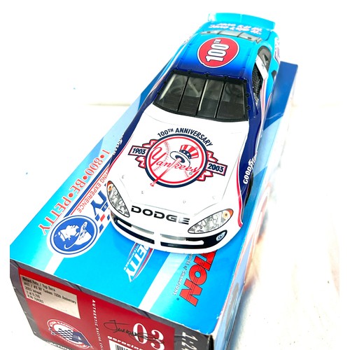 51 - Selection of four original boxed diecast vehicles 'Action' ,' Raced Version 1:24 Scale Stock Cars'