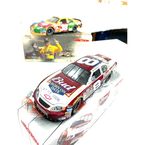 51 - Selection of four original boxed diecast vehicles 'Action' ,' Raced Version 1:24 Scale Stock Cars'