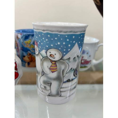 48 - Selection of Disney mugs and Royal Doulton Snowman mugs