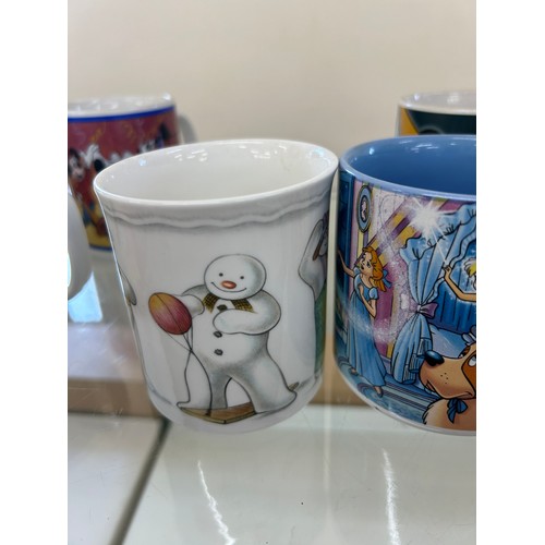 48 - Selection of Disney mugs and Royal Doulton Snowman mugs