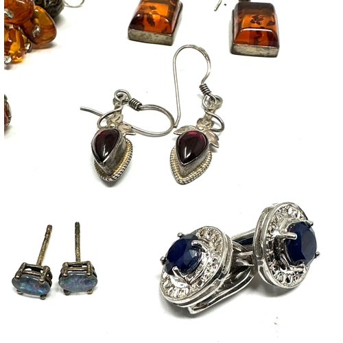 262 - 8 pairs of vintage silver earrings