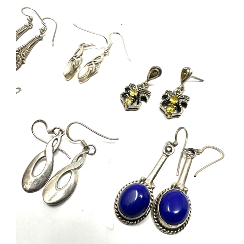 263 - 8 pairs of vintage silver earrings