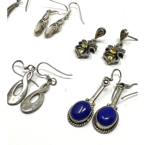 263 - 8 pairs of vintage silver earrings