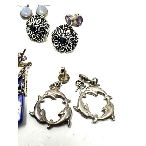 264 - 8 pairs of vintage silver earrings