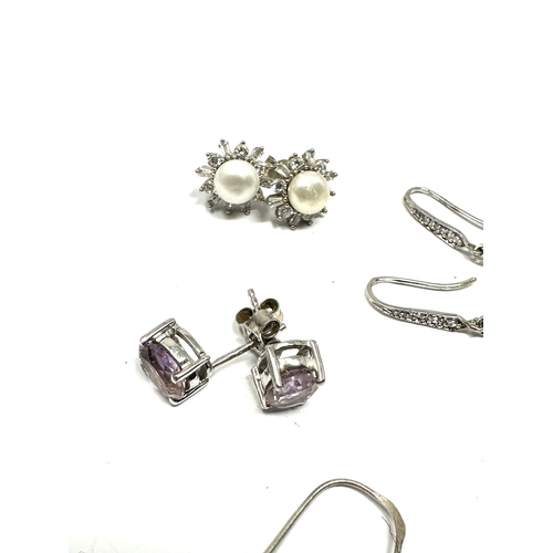 265 - 8 pairs of vintage silver earrings