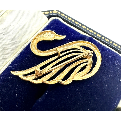 76 - 9ct gold swan brooch weight 2.2g