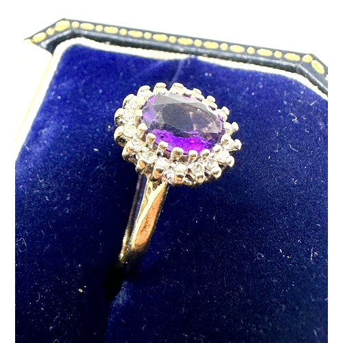 79 - 9ct gold amethyst & diamond halo ring weight 2.3g