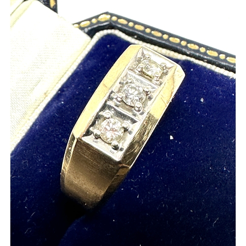 84 - 9ct gold three stone diamond ring weight 6.4g