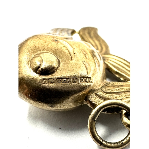 90 - 9ct gold gold fish charm weight 1.4g