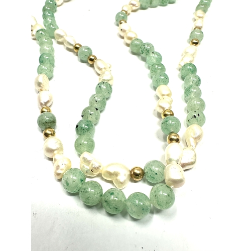 94 - 14ct gold jade & freshwater pearl with gold spacer beads necklace measures approx 82cm long weight 3... 