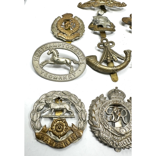 380 - 10 military cap badges inc Northampton yeomanary royal sussex etc