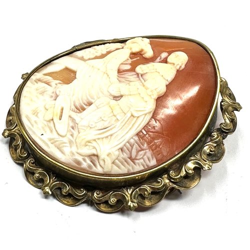 98 - Large victorian cameo brooch yellow metal frame measures approx 6.2cm by 5.5cm