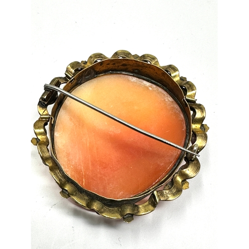 98 - Large victorian cameo brooch yellow metal frame measures approx 6.2cm by 5.5cm