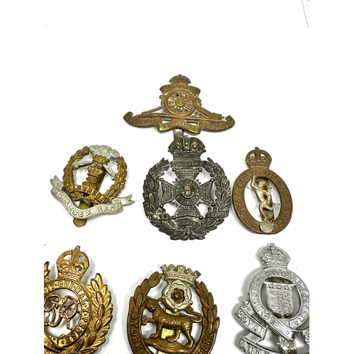 398 - 10 military cap badges inc Gloucestershire middlesex etc