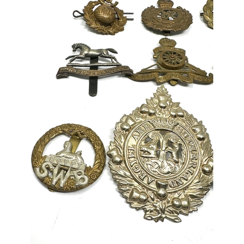 399 - 10 military cap badges inc kings own hussars the west riding etc