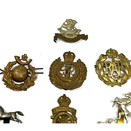 399 - 10 military cap badges inc kings own hussars the west riding etc