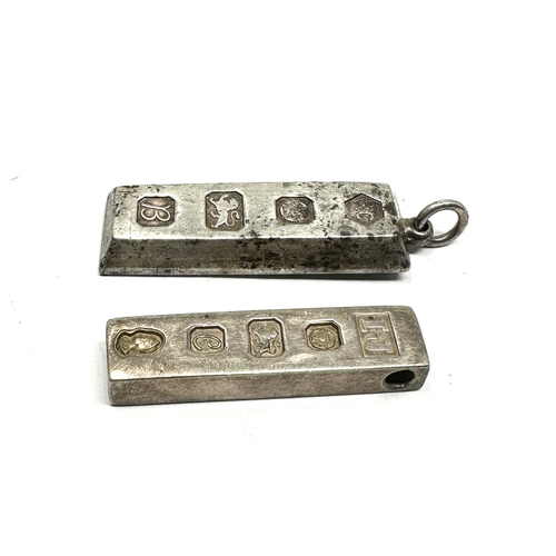 279 - 2 Vintage silver ingot pendants weight 53g