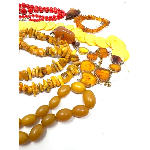 316 - selection of vintage costume necklaces etc includes amber etc weight