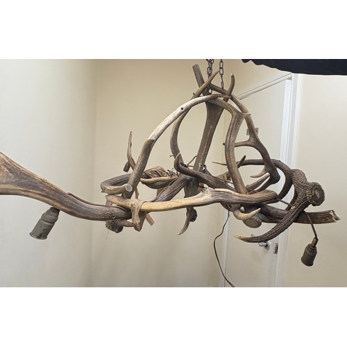 141 - Vintage Antler chandelier measures approximately 37 inches diameter by 21 inches tall