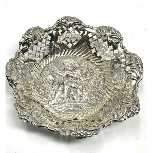 49 - Antique silver cherub embossed sweet dish measures approx 11.5cm dia