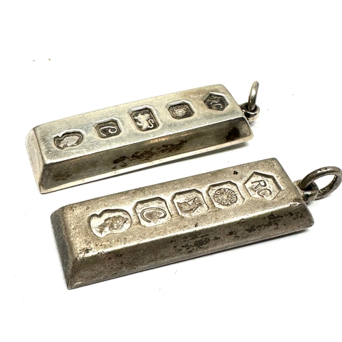 293 - 2 vintage silver ingot pendants weight 62g