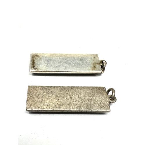 293 - 2 vintage silver ingot pendants weight 62g