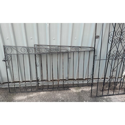 100B - Three pairs of cast iron gates largest measures approximately