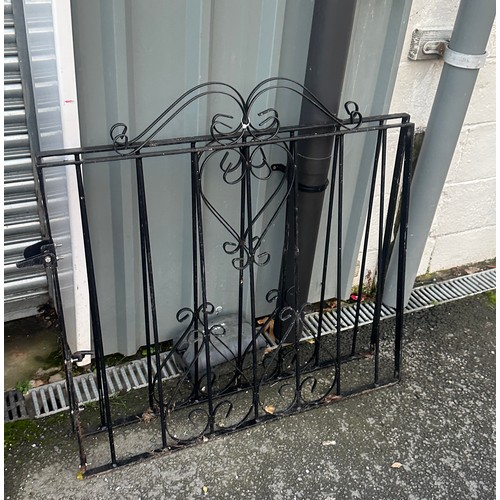 100B - Three pairs of cast iron gates largest measures approximately