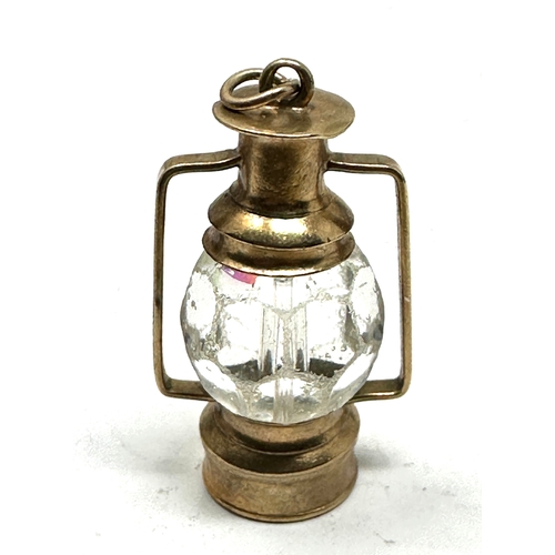 61 - Vintage 9ct gold Lantern Lamp with Crystal Light charm / Pendant measures approx 3.4cm weight 9.6g