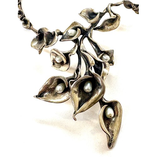 557 - Hallmarked Greek Silver Modernist hand made Elpis Staikos ladies necklace, detailing calla lilies, p... 