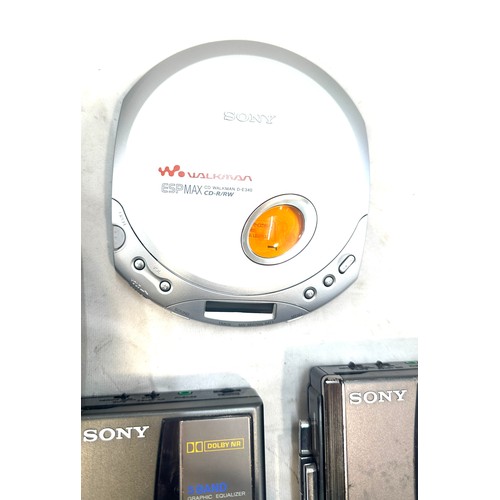 49A - Two vintage Sony Walkman VM-36 cassette player and a Sony walkman cd player model no D-E340 with an ... 