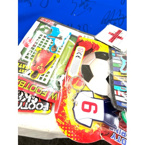 76 - Vintage signed football shirt and a selection of vintage football toys/ memorabilia