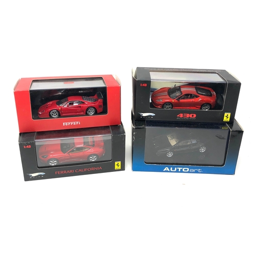 86 - 4 boxed model cars 1.43 scale to include Ferrari etc