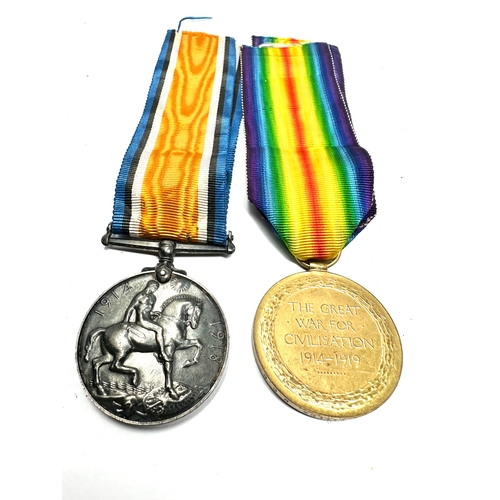 415 - ww1 medal pair pair wounded to 64020 pte i. Fields m.g.c