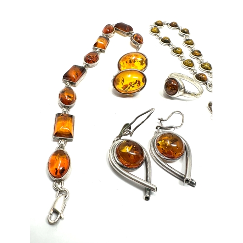 297 - Selection of silver & amber set jewellery includes bracelets earrings etc weight 35g