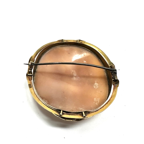 140 - large antique gold framed Cameo brooch frame measures approx 7.2cm by 6.2cm the cameo measures 6.3 b... 