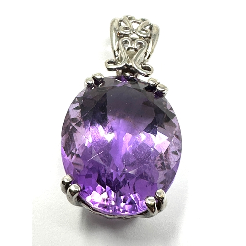 145 - Large 9ct white gold amethyst pendant measures approx 3.1cm drop weight 5.45 g  amethyst measures ap... 