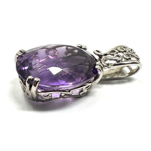 145 - Large 9ct white gold amethyst pendant measures approx 3.1cm drop weight 5.45 g  amethyst measures ap... 