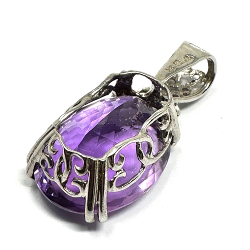 145 - Large 9ct white gold amethyst pendant measures approx 3.1cm drop weight 5.45 g  amethyst measures ap... 