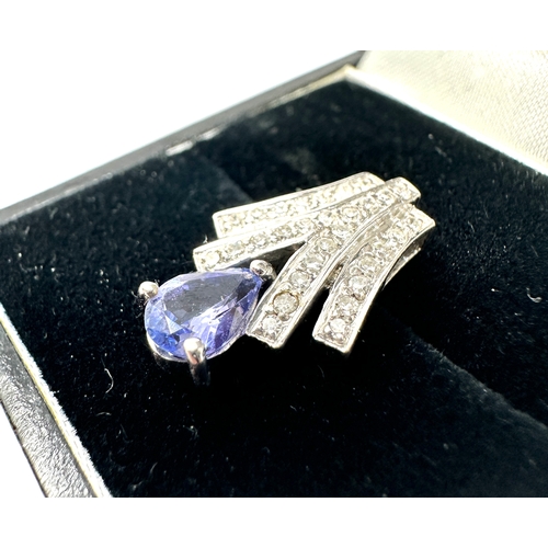 148 - 9ct white gold Diamond & Tanzanite pendant  measures approx 1.9cm drop weight 1.82g