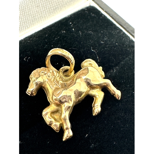 151 - 9ct gold horse charm /pendant weight .9g