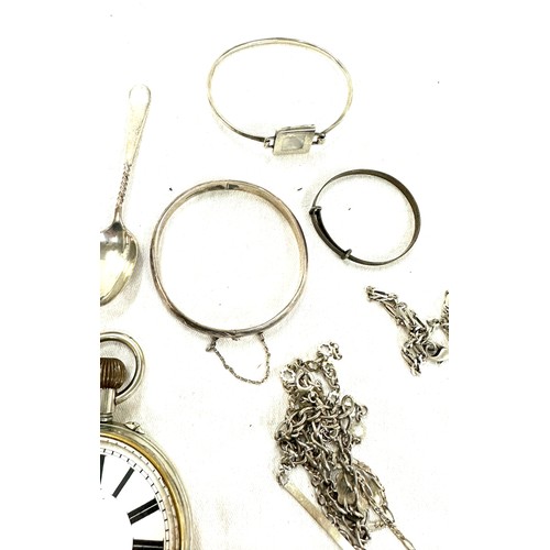 519 - Selection of silver to include a coin twisted tall spoon, silver jewellery, packet watch for spares ... 